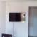 Citrus, alojamiento privado en Djenović, Montenegro - Trpezarija i TV u apartmanu 1c